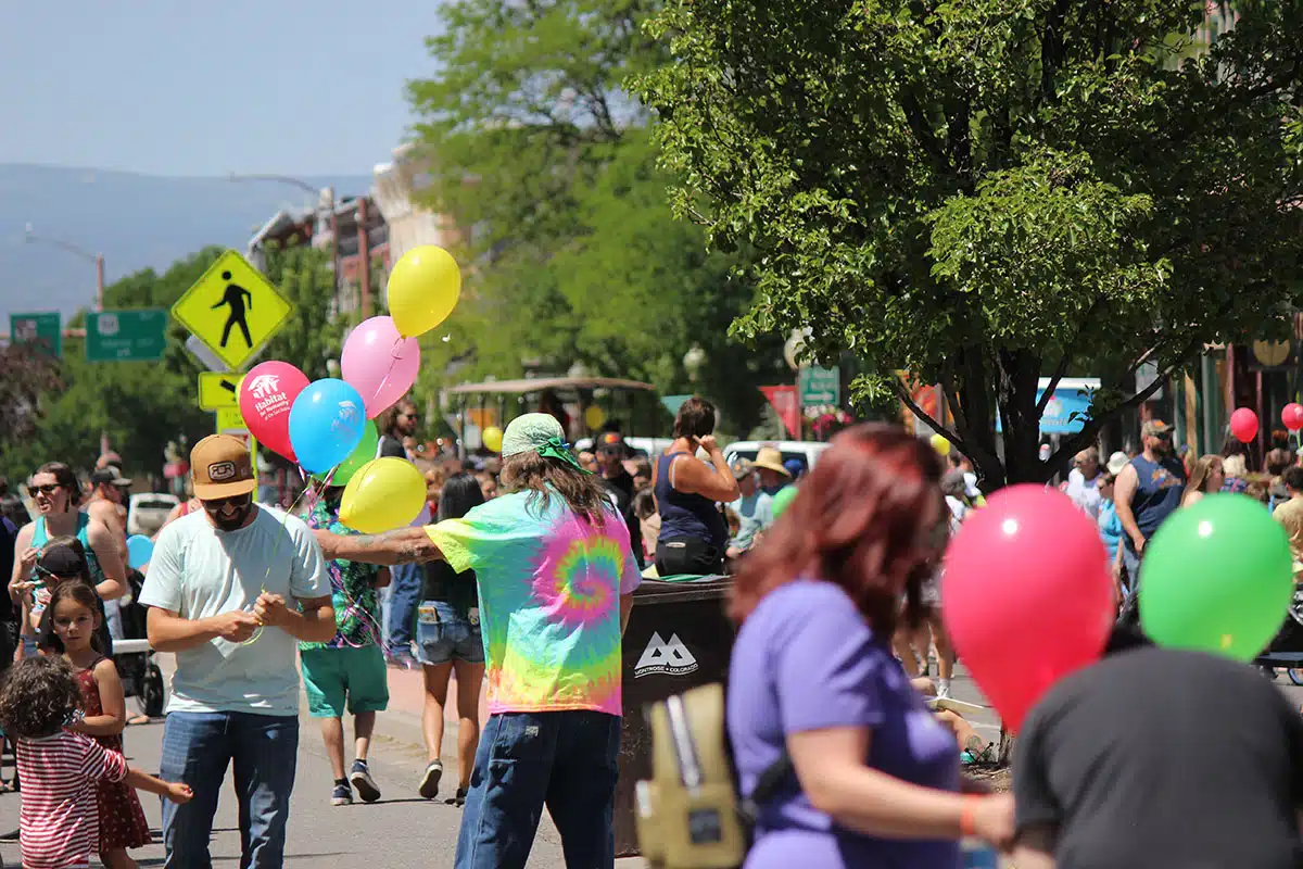 Balloons and people on main street