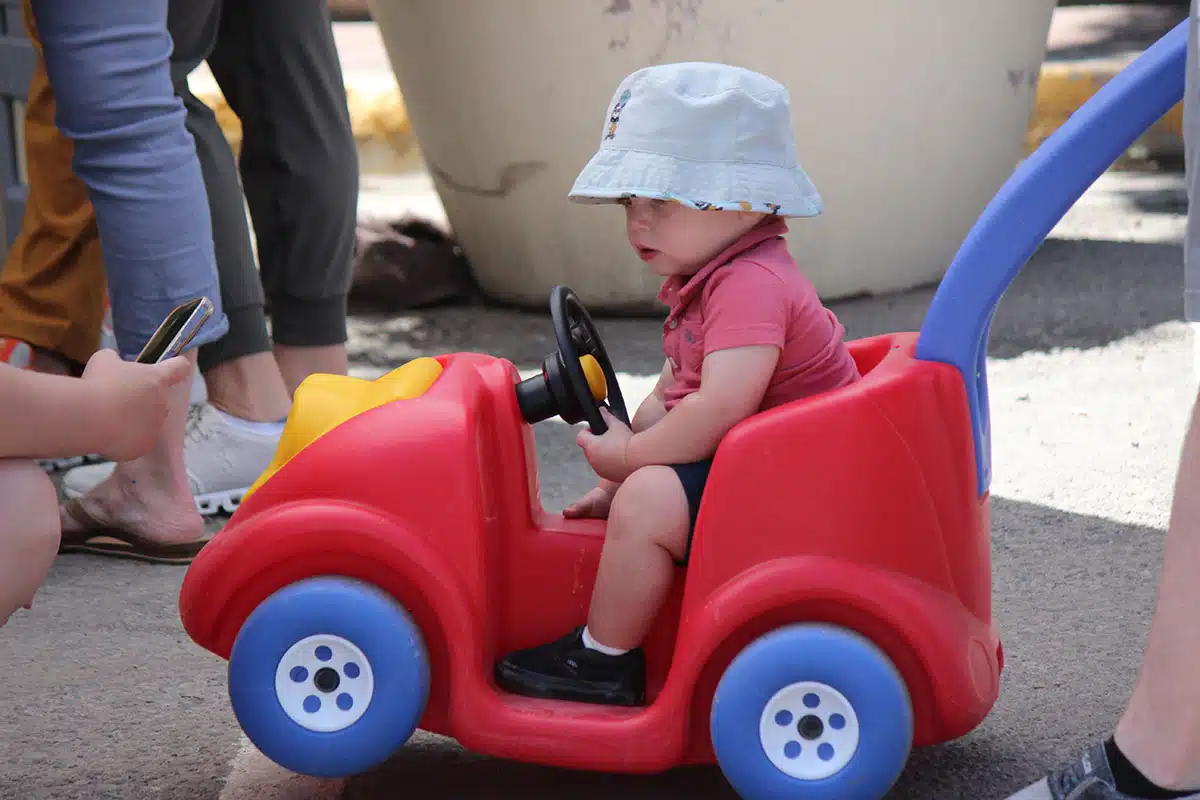 Kid in a car push stroller