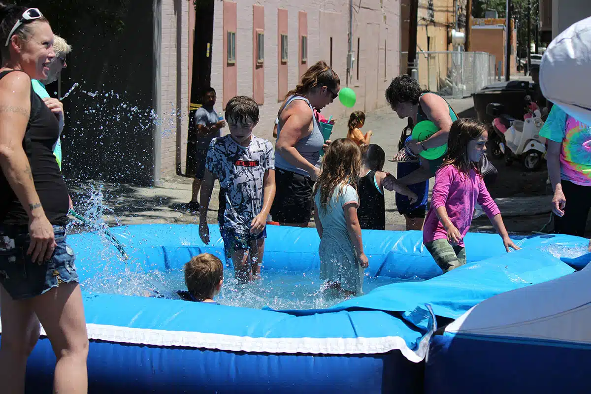 Kids playing in inflatable pool