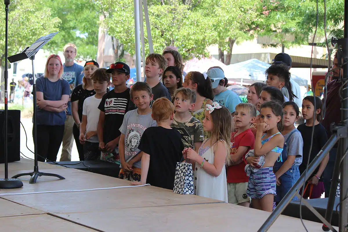 Kids watching on stage